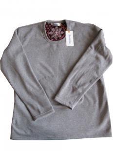 生物磁套服 服裝批發(fā)市場(chǎng)的新寵——探秘珊瑚絨套服熱銷背后的健康潮流